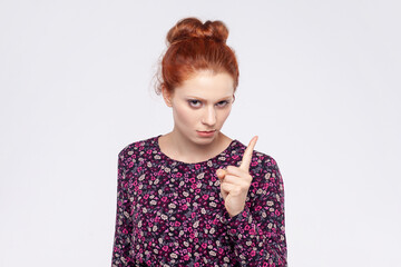 Hey you, be careful. Portrait of strict serious redhead woman wearing dress seriously pointing...