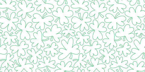 Green shamrock seamless pattern illustration. Natural clover leaf plant background print. St. Patrick's day holiday backdrop texture, irish culture wallpaper design.	