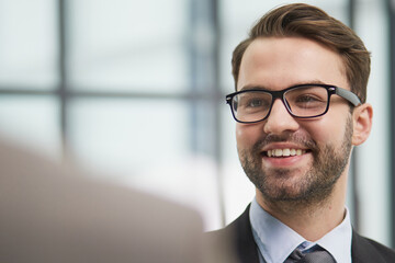 Friendly male professional colleagues greeting handshaking meeting in company office hall