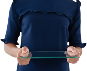 Mid section of female executive holding glass interface