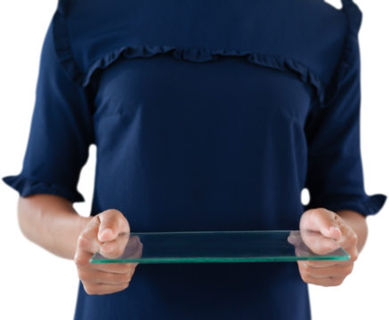 Mid section of female executive holding glass interface