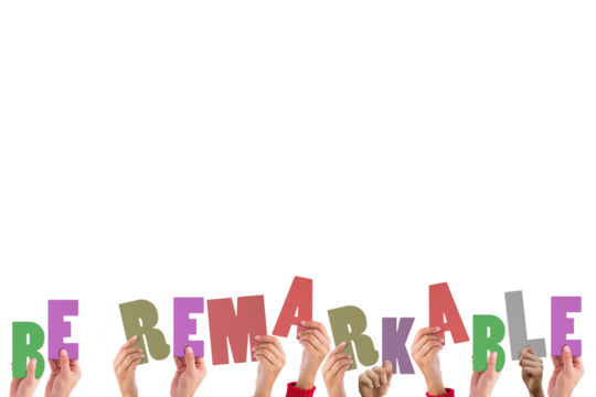 Cropped hands holding colorful words be remarkable - Powered by Adobe