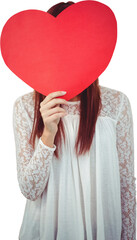 Smiling hipster woman behind a big red heart