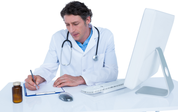 Doctor writing on paper while sitting at desk