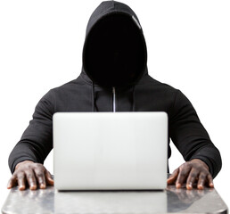 Male hacker with laptop on table 