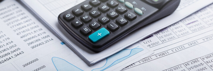 calculator and accounting document. Concept of banking, financial report and financial audit.