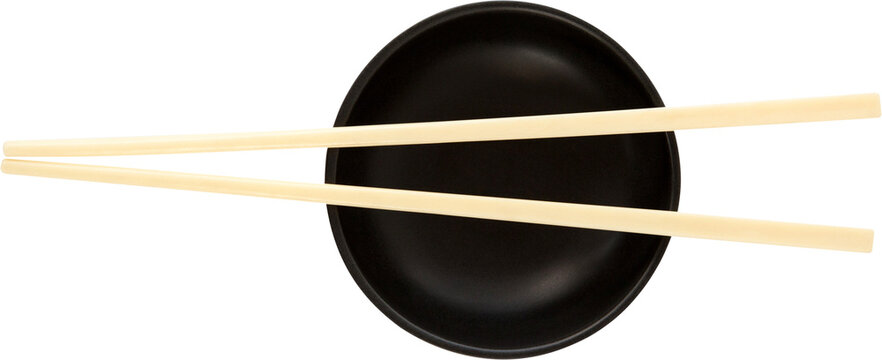 Close up of chopstick on black bowl