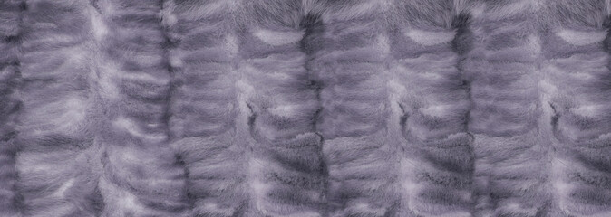 woolen violet background. fleecy grey texture. the concept of wool products. fur soft purple surface