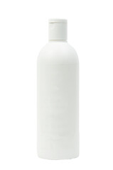 shower gel in a light bottle on a white background. hygiene product in a plastic white bottle on a light texture. shampoo production concept