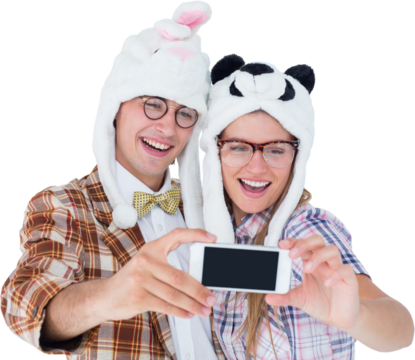 Geeky hipster couple taking selfie with smart phone 