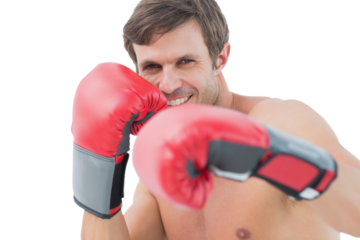 Portrait of smiling man wearing boxing gloves 