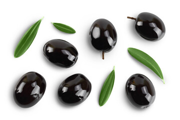 Black olives with leaves isolated on a white background with full depth of field. Top view. Flat lay