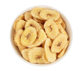 Dried banana chips in ceramic bowl isolated on white background with full depth of field. Top view. Flat lay