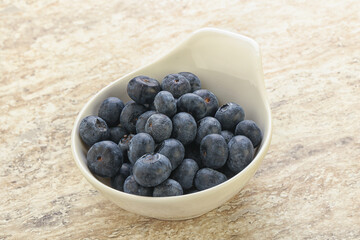Sweet ripe blueberry heap in the bowl