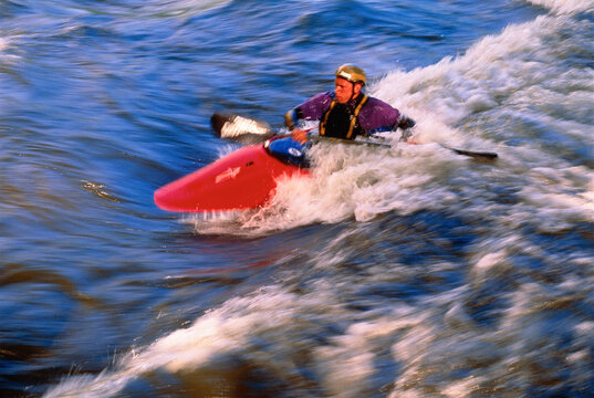 Man Kayaking Kern River, California, USA