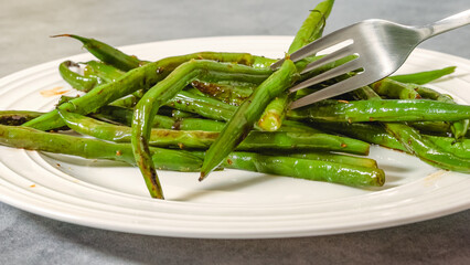 Pan fried French green beans (Haricots Verts) recipe. String beans close-up