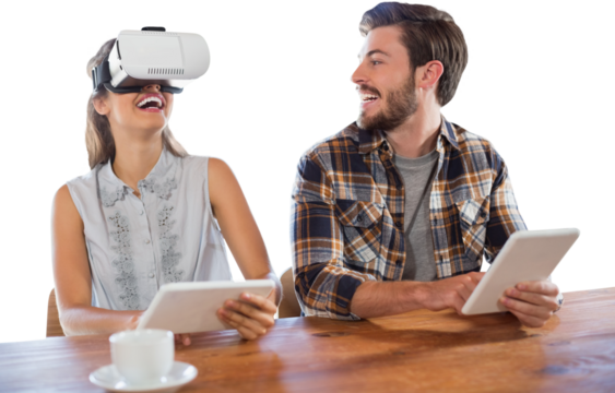 Man looking happy woman wearing virtual reality glasses while using digital tablets together - Powered by Adobe