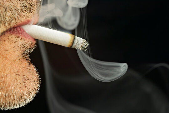 Close Up of Man Smoking Cigarette