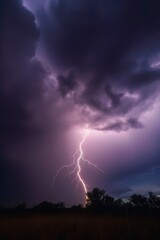 Naklejka na ściany i meble lightning striking over dark clouds with lightning bolting from the sky