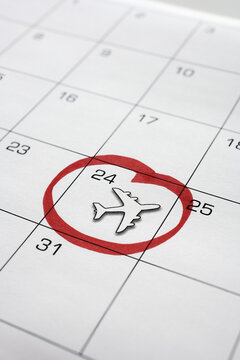 Calendar with Airplane Circled
