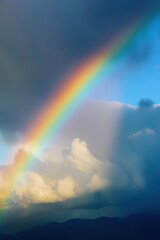 Fototapeta premium rainbow over stormy sky with clouds