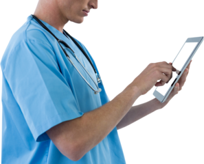 Midsection of male nurse using digital tablet