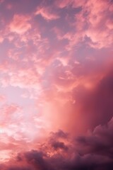 Obraz premium a pinkish sunset with clouds on high octane backgrounds