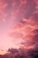 Obraz premium a pinkish sunset with clouds on high octane backgrounds