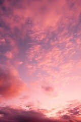 a pinkish sunset with clouds on high octane backgrounds