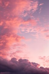 Fototapeta premium some clouds are over a pink sky