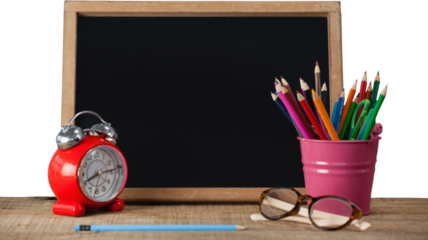 Slate with desk organizer and alarm clock by eyeglasses