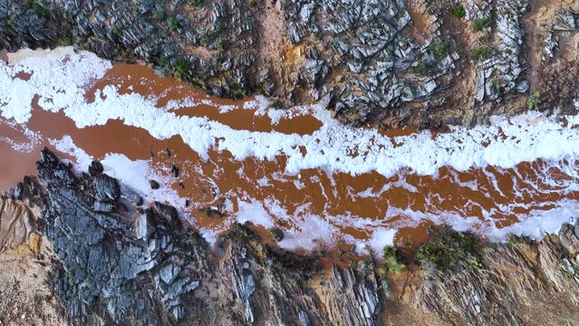 Rio Tinto textures. Aerial view from a drone in the surroundings of the town of Berrocal. Sierra Morena, Gulf of C&aacute;diz, Huelva, Andalusia, Spain, Europe