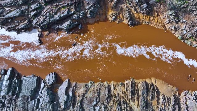 Rio Tinto textures. Aerial view from a drone in the surroundings of the town of Berrocal. Sierra Morena, Gulf of C&aacute;diz, Huelva, Andalusia, Spain, Europe