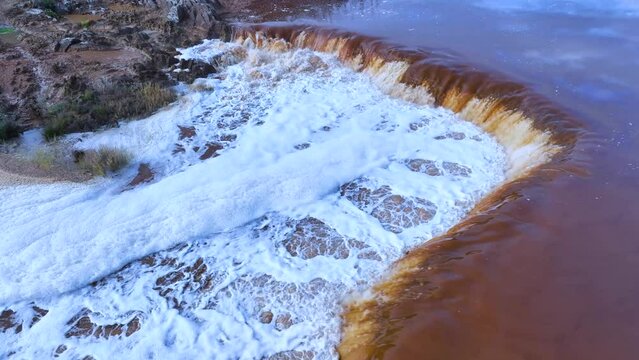Rio Tinto textures. Aerial view from a drone in the surroundings of the town of Berrocal. Sierra Morena, Gulf of C&aacute;diz, Huelva, Andalusia, Spain, Europe