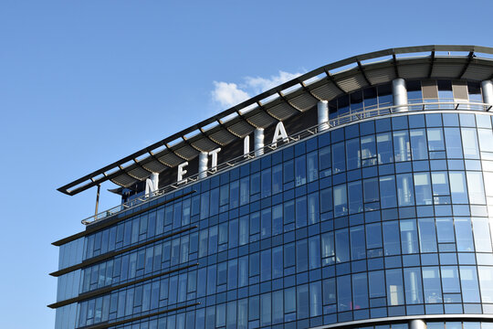 NETIA company logo on the facade of the Netia SA building, popular Polish provider of telecommunication services, internet and cable television. WARSAW, POLAND - JUNE 12, 2020