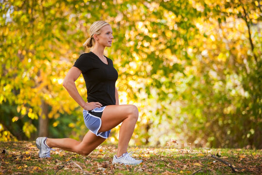 Woman Stretching After a Run, Seattle, Washington, USA