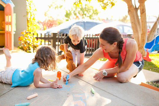 Family Playing on Porch, Newport Beach, Orange County, California, USA