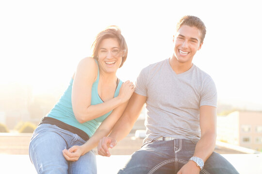 Portrait of Couple Outdoors on Rooftop, Portland, Oregon, USA