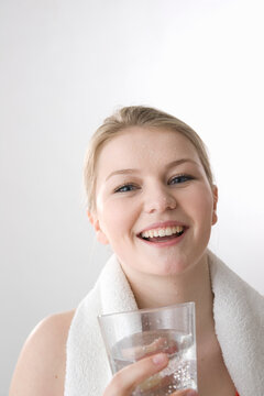 Sweaty Woman with Glass of Water