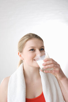 Woman Drinking Glass of Milk