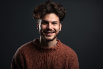 Obraz premium Portrait of handsome young man in sweater on dark background, closeup