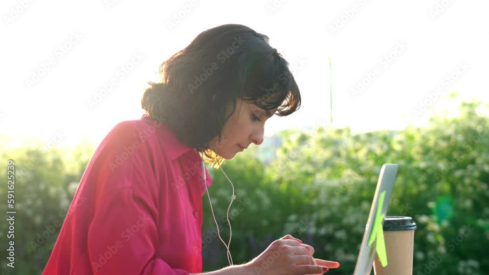 Aufkleber female digital nomad using cellular and laptop technologies for doing remote project and communicate