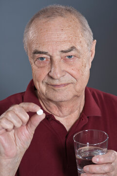 Man Taking Pill
