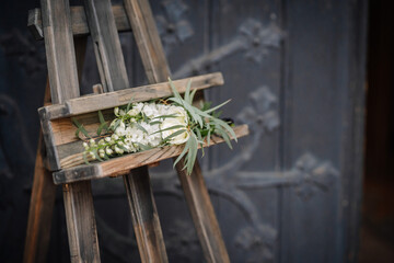 Flowers placed on the easel in memory, at the funeral