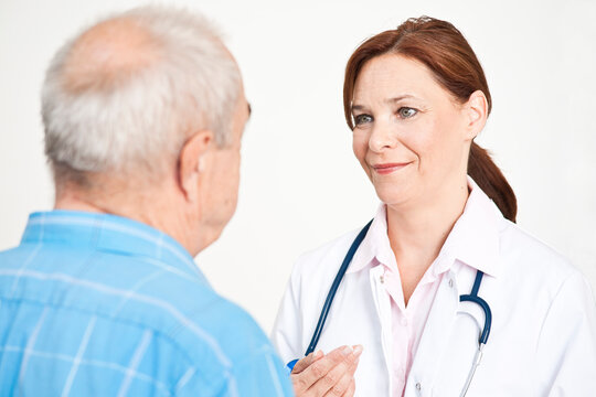 Close-up of Caregiver Speaking to Patient