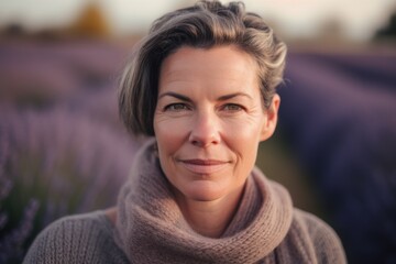 Portrait of a middle-aged woman in a lavender field