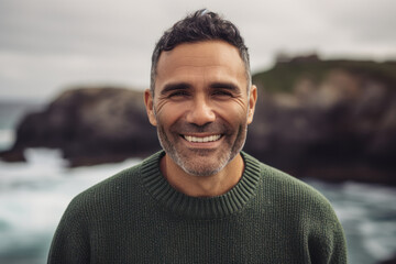 Headshot portrait photography of a grinning man in his 30s wearing a cozy sweater against a tropical island background. Generative AI