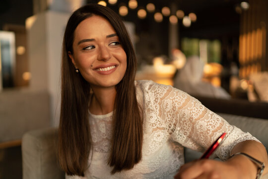 Portrait of a young smiling woman
