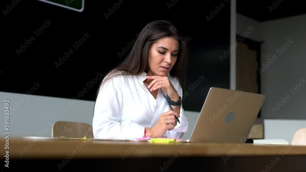 Aufkleber caucasian female working on modern laptop computer creating business plan at table desktop, millenni