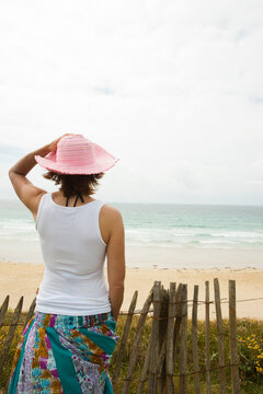 Rear View of Woman on Beach, Camaret-sur-Mer, Crozon Peninsula, Finistere, Brittany, France